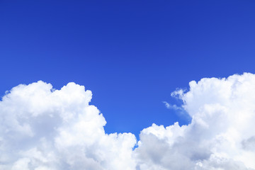 Naklejka na ściany i meble huge white cloud on blue sky background