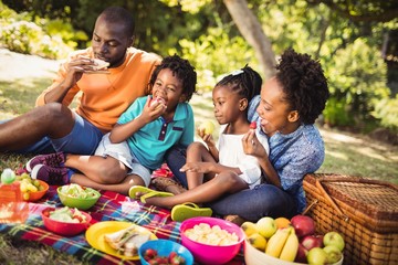 Happy family eating together 