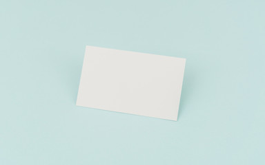 Blank business card on blue background .