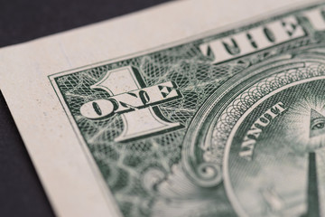 US one dollar, detail view. Macro with selective focus and shallow depth of field.