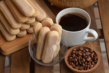 Cooking Tiramisu concept step by step. Homemade tiramisu cake. Ingredients for making perfect Italian dessert.