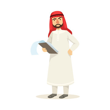 Arabic Muslim Businessman Dressed In Traditional Thwab Clothes And Wearing Headdress Kufiya Working In Financial Business Sphere Checking The Files