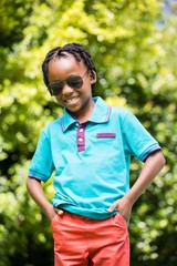 Fototapeta premium Smiling boy wearing sunglasses