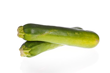 zucchinis or courgettes isolated on a white background..