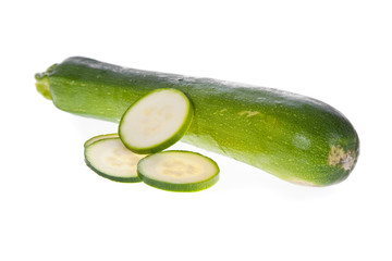 Sliced zucchini or courgette isolated on a white background..