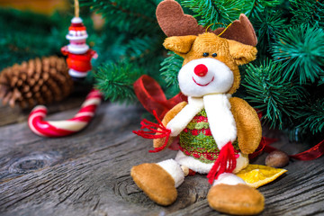 Christmas wooden background with snow fir tree. View copy space