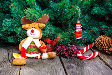 Christmas wooden background with snow fir tree. View copy space