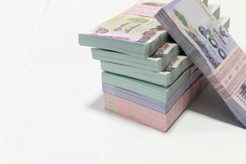 Thai currency on White background ,Stack of thai baht