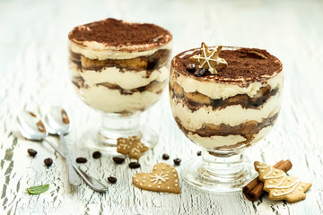 Italian dessert tiramisu in glass, sweet food, homemade christma