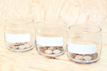 Glass jars with empty space for text, savings concept