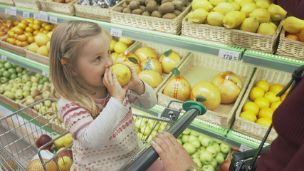 Family makes purchases in the supermarket
