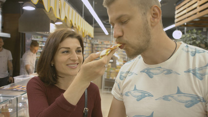 Family makes purchases in the supermarket