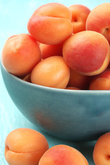 Apricots in blue bowl