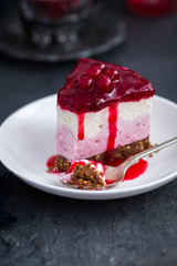 no baked cranberry  cheesecake on dark background