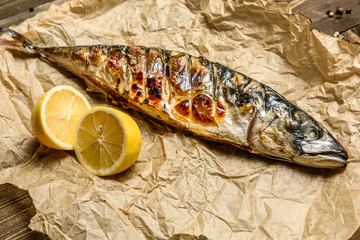 Baked mackerel with lemon on baking paper
