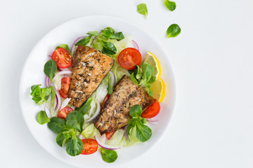 roasted mackerel fish with fresh salad,