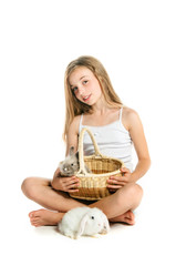 Happy little girl with rabbit