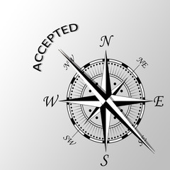 Illustration of accepted word written aside compass