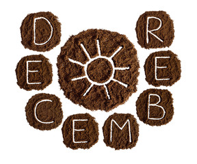 December and sun, decorated with ground coffee on white background