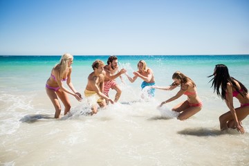  Friends having fun at the beach