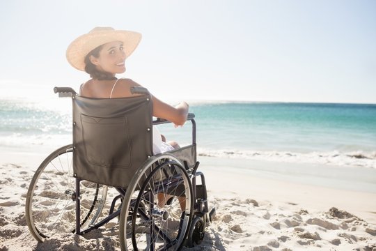  Wheelchair woman sitting smiling at camera