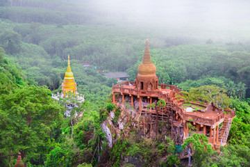 Landscape view of Khao Na Nai Luang temple on peak mountain at Suratthani province, Southern of Thailand.