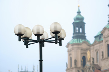 Fototapeta na wymiar Prague, Czechia - November, 21, 2016: St. Nicholas Church on Old Town Square in Prague, Czechia