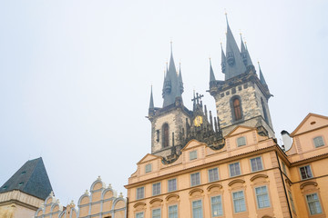 Fototapeta na wymiar Prague, Czechia - November, 21, 2016: Gothic Church of Our Lady before Týn on Old Town Square in a center of Prague, Czechia