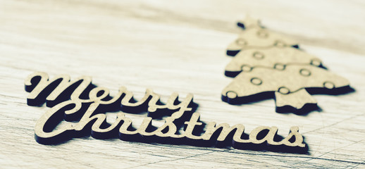 text merry christmas and christmas tree