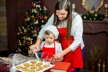 children baking christmas cookies