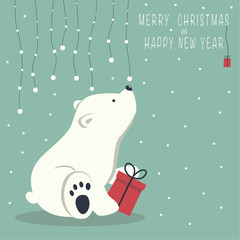The cover design. Depicts a seated little polar bear with gift box. A garland of snow balls over a bear and the phrase merry Christmas and a happy New year on blue background.
