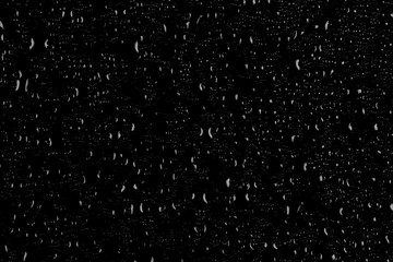 Drops of water on a dark glass