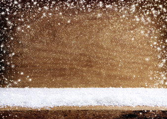 Christmas wooden background with snowfall.