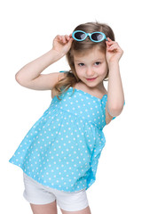 Pretty little girl in a polka dot blue dress