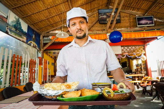 Indian Chef Serving Food