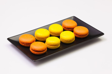Traditional french colorful macarons on the plate