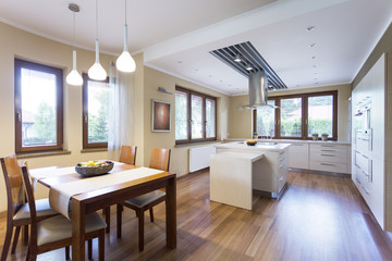 Modern kitchen with many windows
