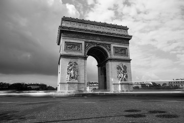 Fototapeta na wymiar Triumphal arch. Paris. France. View Place Charles de Gaulle. Famous touristic architecture landmark in summer night. Napoleon victory monument. Symbol of french glory. World historical heritage. Toned