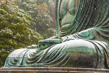 Fototapeta premium The Great Buddha in Kamakura.It's snowing. Located in Kamakura, Kanagawa Prefecture Japan.