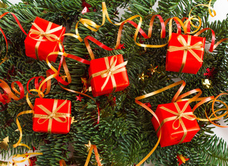 Christmas or New Year background: fur-tree, branches, gifts, decoration on a white background