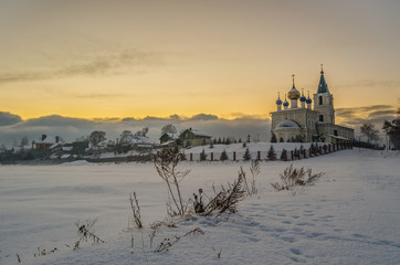 church Saint Michaels in Bolshoye Kozino Nizhny Novgorod region Russia at the sunset of 26 november...