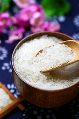 tai rice in a wooden bowl
