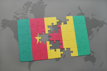 puzzle with the national flag of cameroon and guinea on a world map.