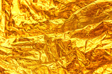 Abstract Golden luxury grunge foil  texture background.