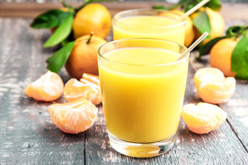 Fresh juice of ripe mandarins in a small glass