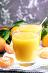Fresh juice of ripe mandarins in a small glass