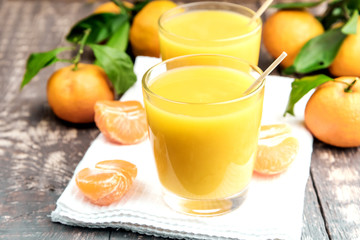 Fresh juice of ripe mandarins in a small glass