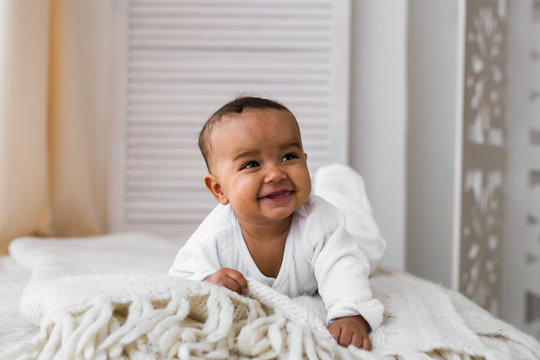 Adorable little african american baby boy laughing - Black people