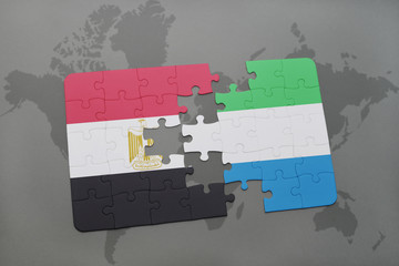 puzzle with the national flag of egypt and sierra leone on a world map.