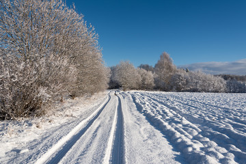 Obraz premium Rural road in winter time.